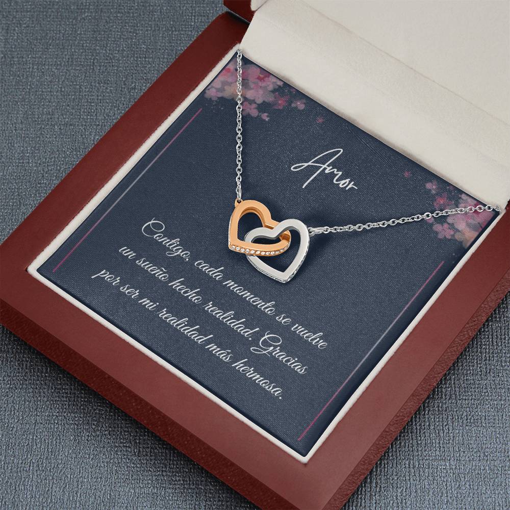 Intertwined hearts necklace